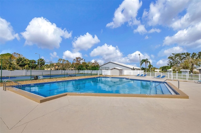 view of swimming pool featuring a patio