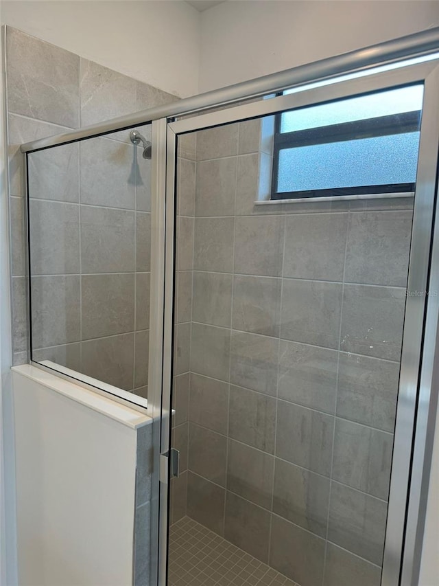 bathroom featuring walk in shower