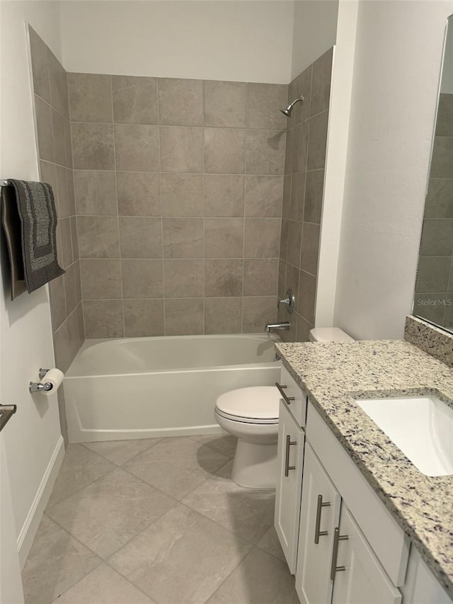 full bathroom with tile patterned floors, vanity, toilet, and tiled shower / bath