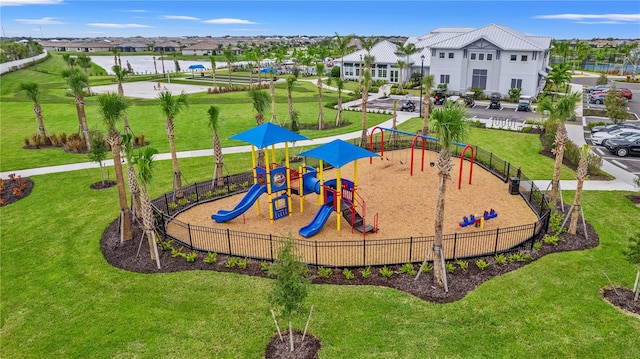 view of playground featuring a lawn