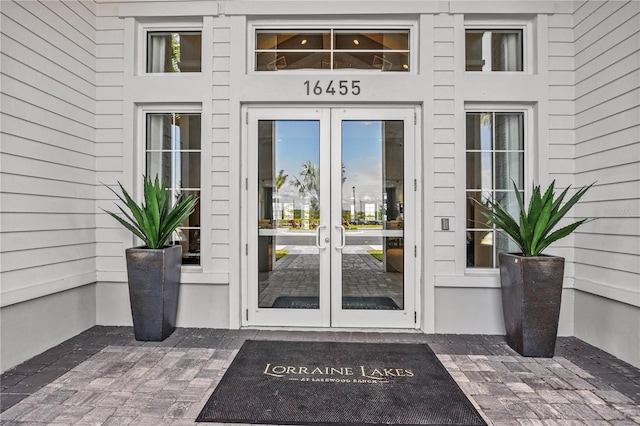 entrance to property featuring french doors