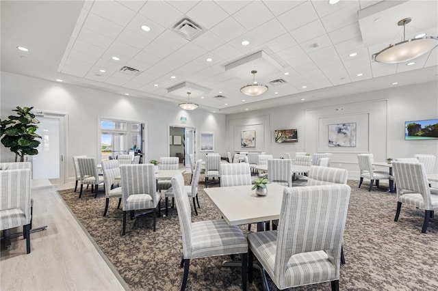 dining area with light hardwood / wood-style flooring