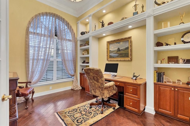 office space with dark hardwood / wood-style flooring, built in features, and crown molding