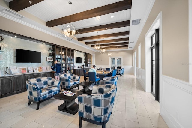 tiled living room featuring ornamental molding, a notable chandelier, and beam ceiling