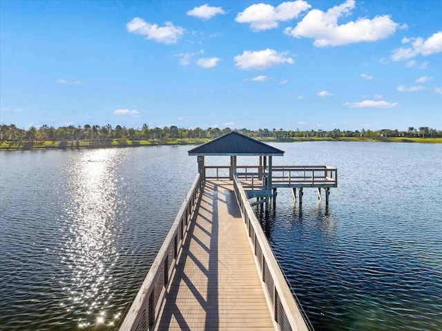 view of dock with a water view and a gazebo