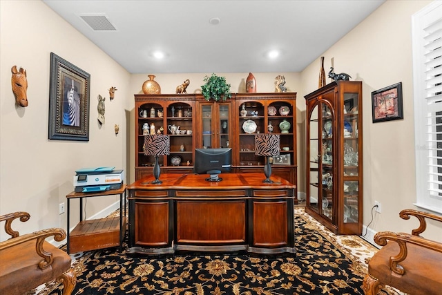 office area featuring visible vents