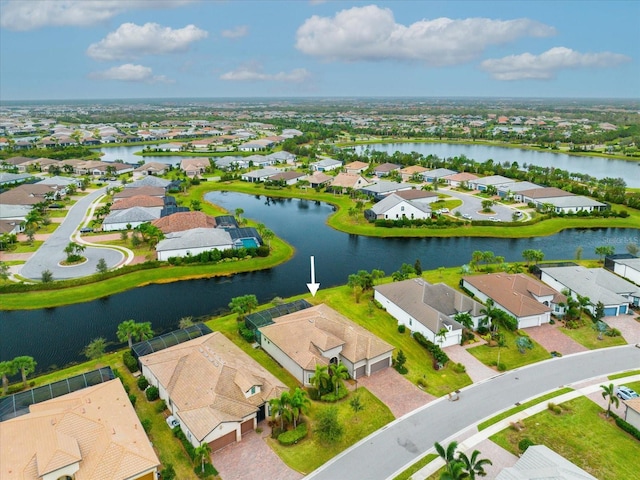 aerial view with a residential view and a water view