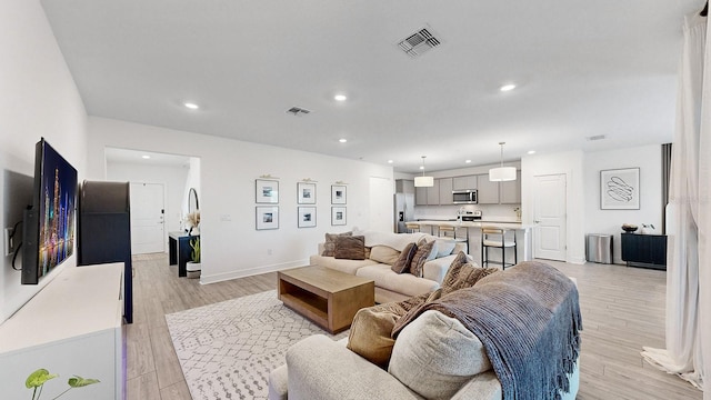 living room featuring light hardwood / wood-style floors