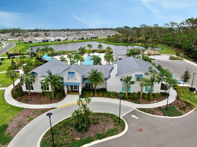 drone / aerial view with a water view