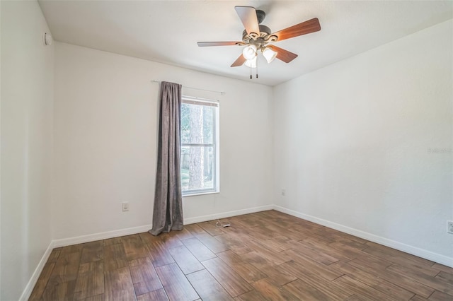 unfurnished room featuring hardwood / wood-style flooring and ceiling fan