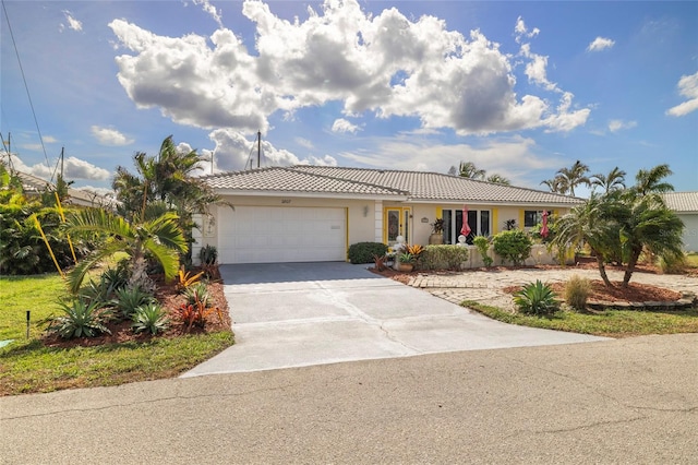 single story home featuring a garage