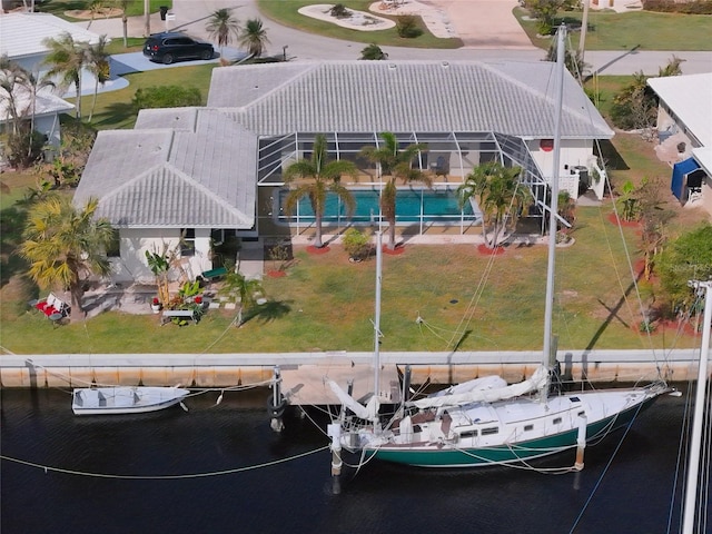 drone / aerial view featuring a water view