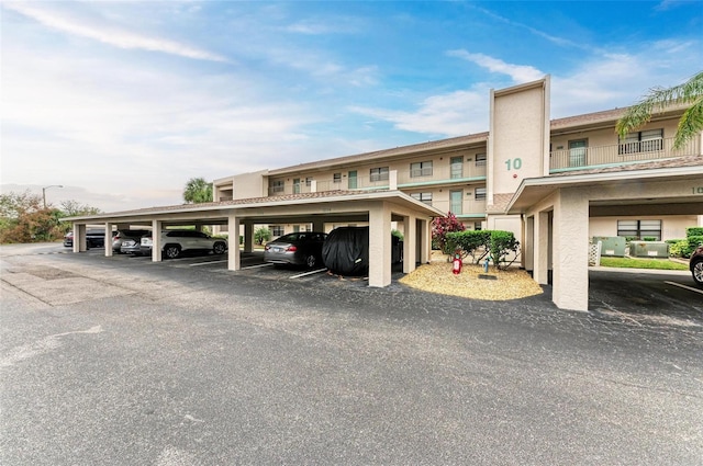 view of parking with a carport