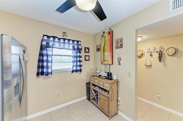 interior space featuring light tile patterned floors