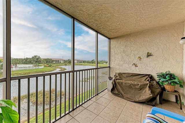 sunroom with a water view