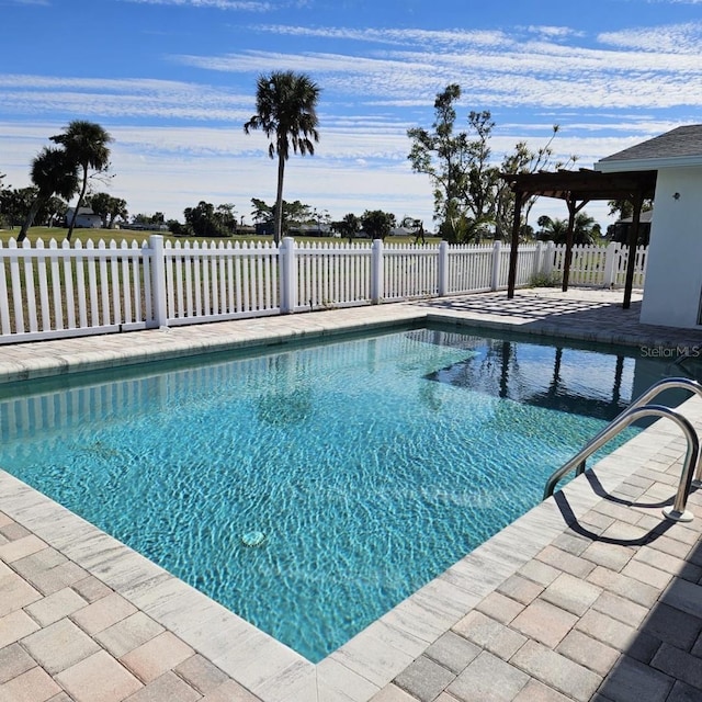 view of swimming pool featuring a patio