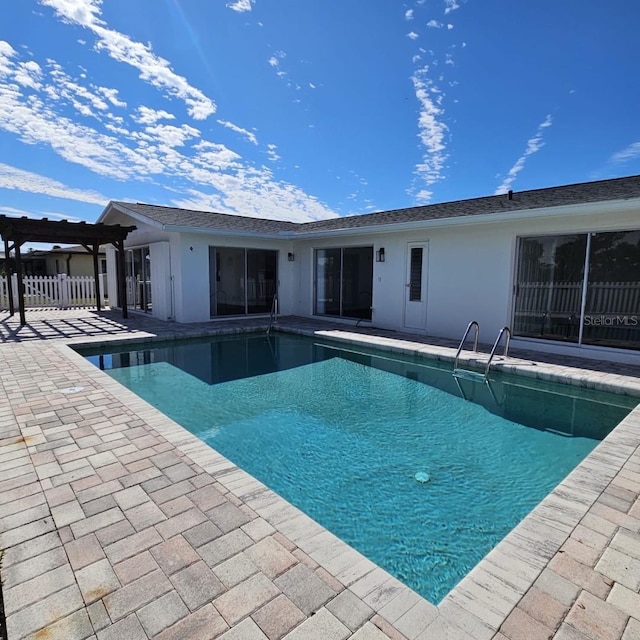 view of swimming pool with a pergola and a patio