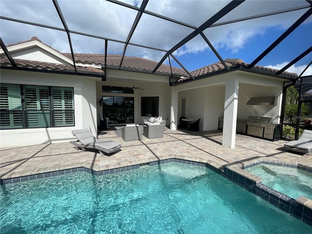 back of house with a lanai, ceiling fan, a swimming pool with hot tub, and a patio