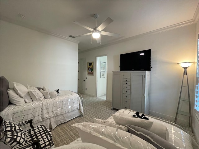 bedroom featuring visible vents, ornamental molding, light carpet, ceiling fan, and baseboards