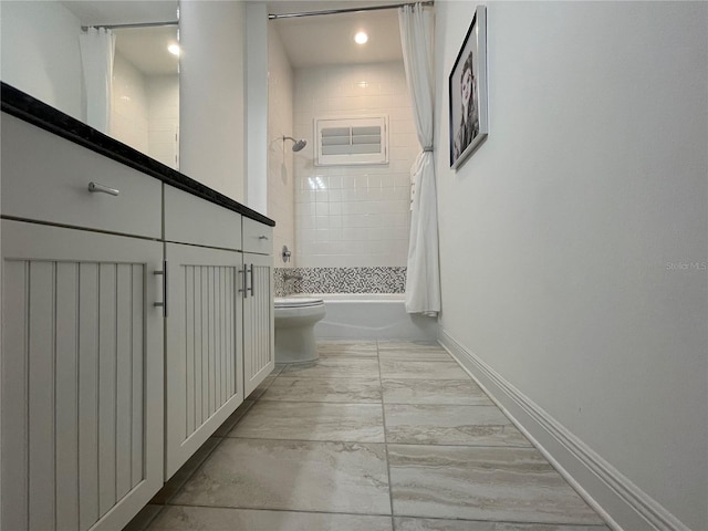 corridor with marble finish floor and baseboards