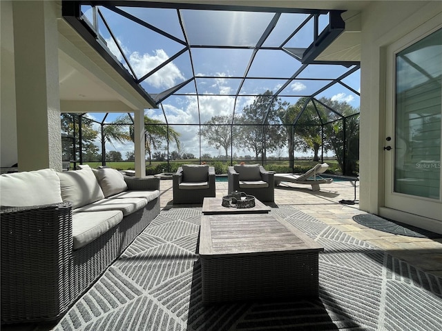 view of patio featuring an outdoor hangout area and glass enclosure