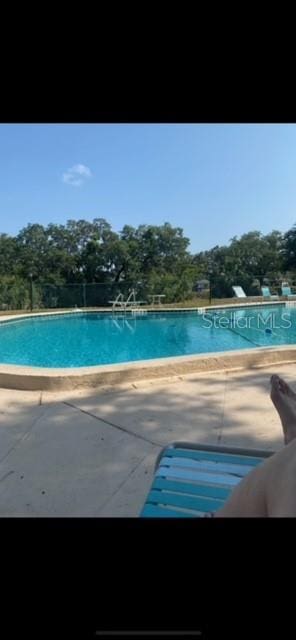 pool featuring a patio