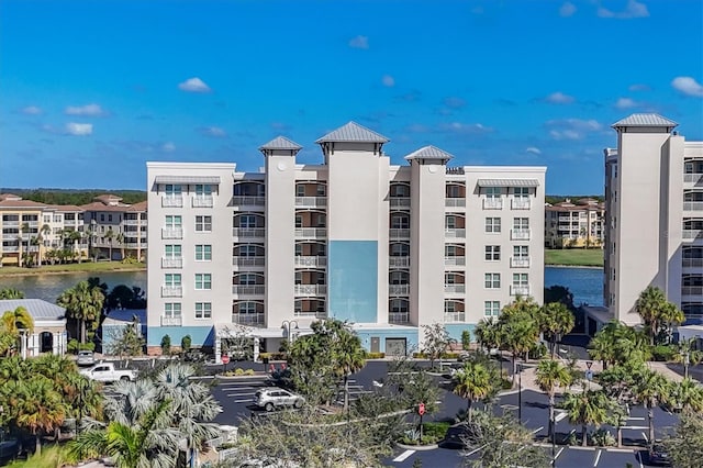 view of property with a water view