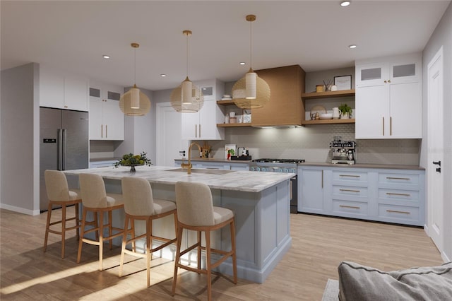 kitchen with white cabinets, premium appliances, light wood-style floors, open shelves, and backsplash