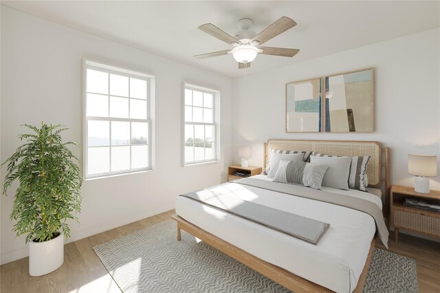 bedroom featuring ceiling fan and wood finished floors