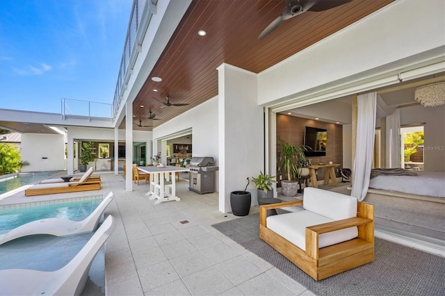 view of patio / terrace featuring ceiling fan and a grill