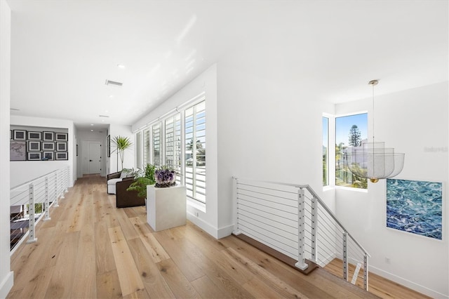 hall featuring light hardwood / wood-style floors