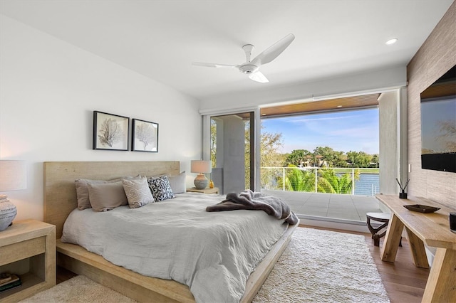 bedroom featuring hardwood / wood-style floors and ceiling fan