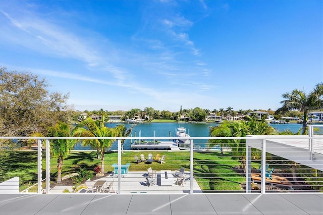 balcony featuring a water view