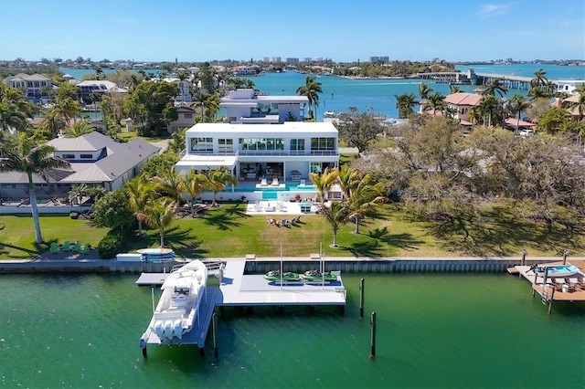 birds eye view of property featuring a water view