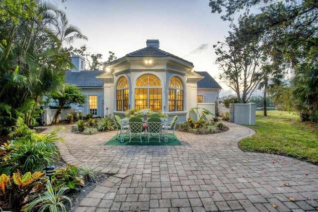 rear view of house with a patio area