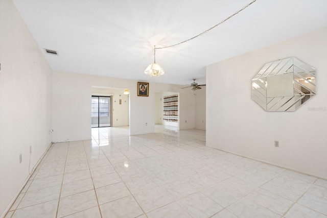 spare room with ceiling fan