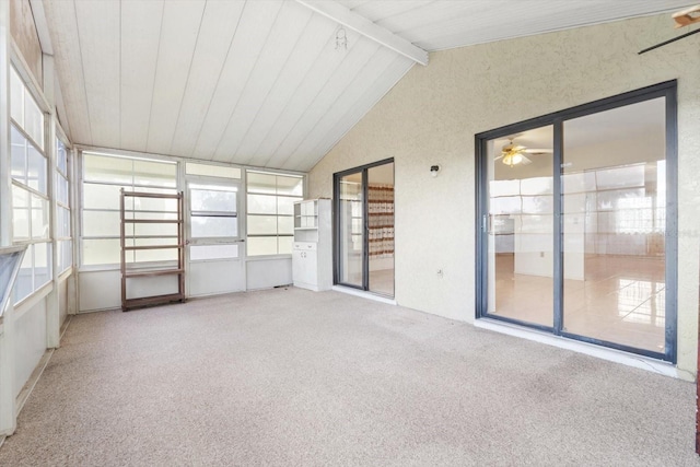 unfurnished sunroom with ceiling fan, wood ceiling, and lofted ceiling with beams