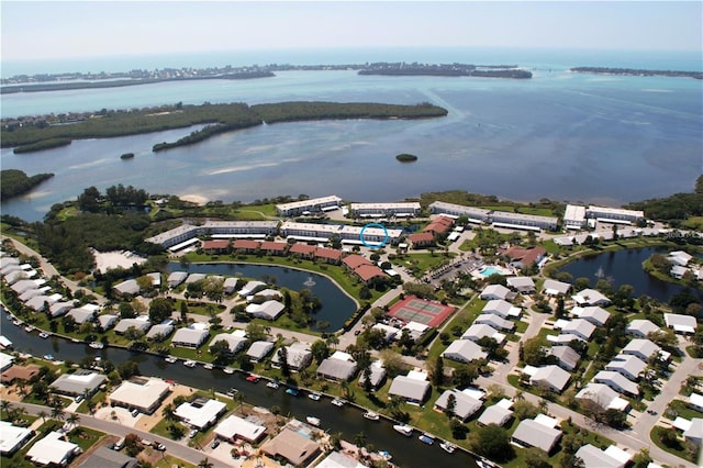 bird's eye view featuring a water view and a residential view