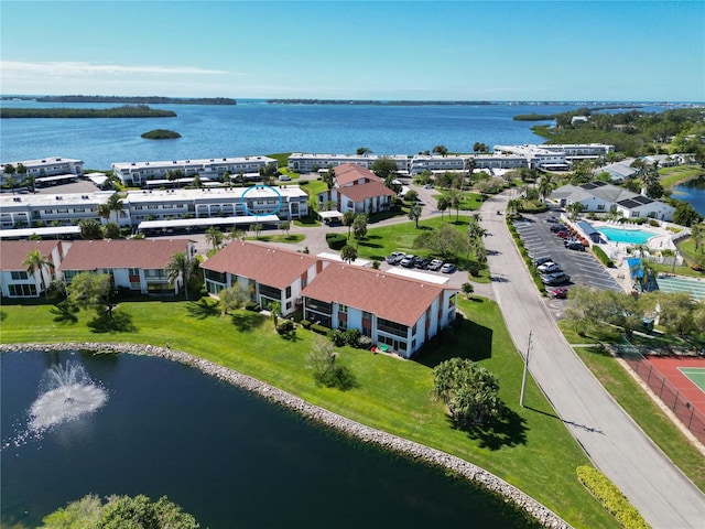 bird's eye view featuring a residential view and a water view