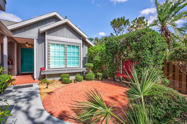 property entrance with a patio area