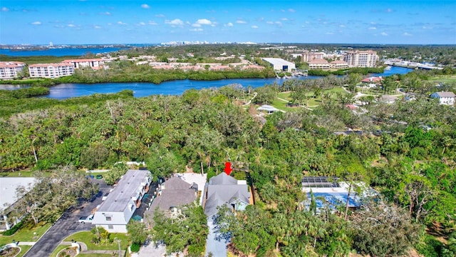 birds eye view of property with a water view