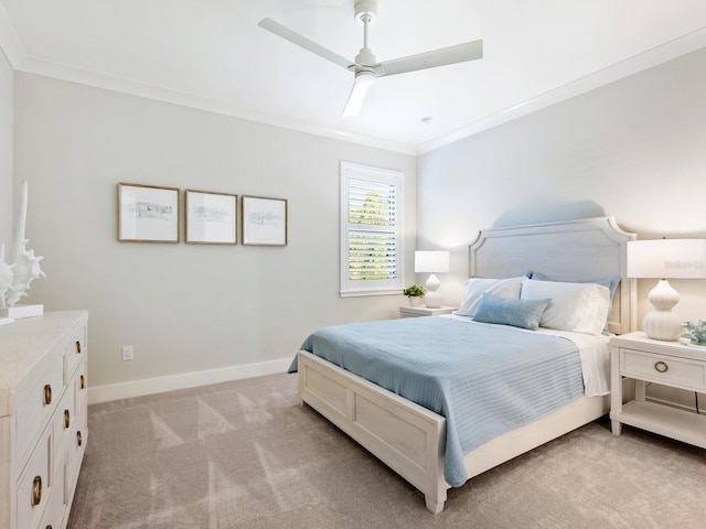 bedroom with ceiling fan, ornamental molding, and light carpet