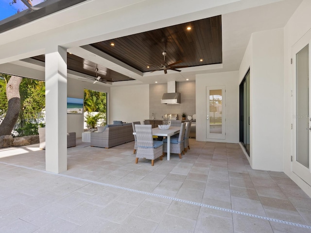 view of patio / terrace with an outdoor living space and ceiling fan