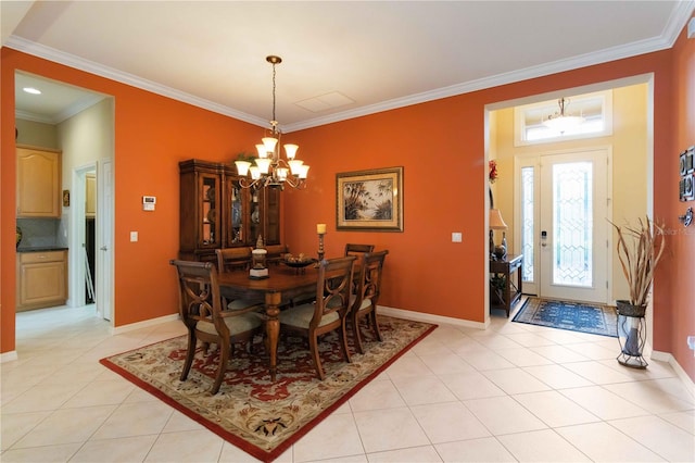 tiled dining room featuring a chandelier and ornamental molding