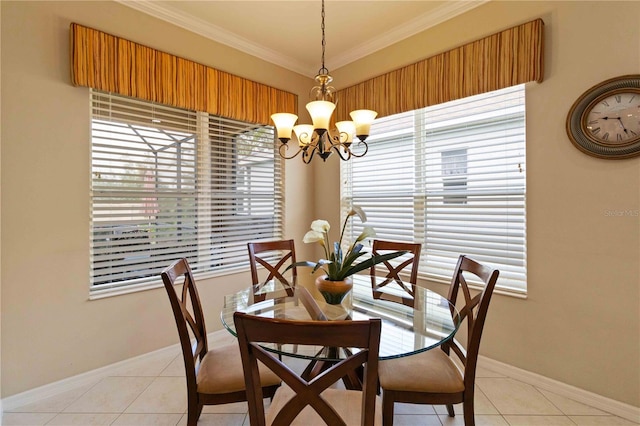 dining room with light tile patterned floors, ornamental molding, and a notable chandelier