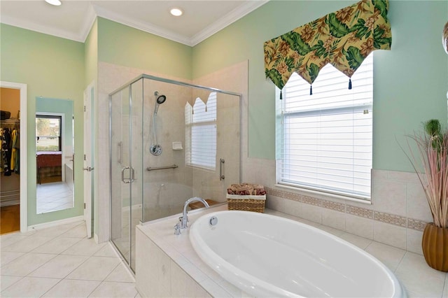 bathroom with tile patterned floors, independent shower and bath, and ornamental molding