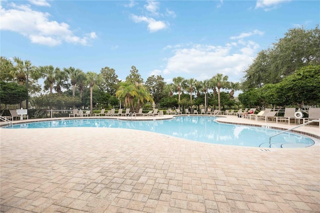 view of pool featuring a patio area