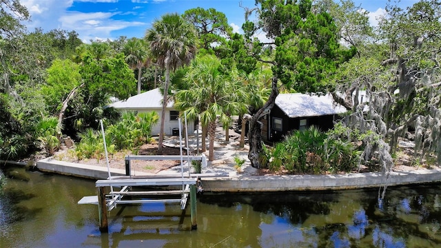 view of dock with a water view