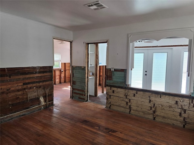 interior space featuring french doors and dark wood-type flooring