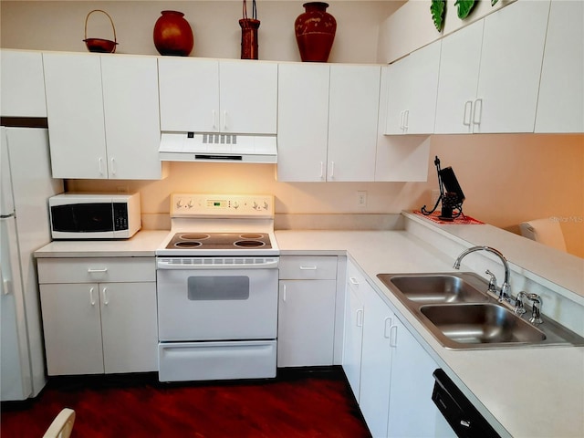 kitchen with white cabinets, white appliances, ventilation hood, and sink